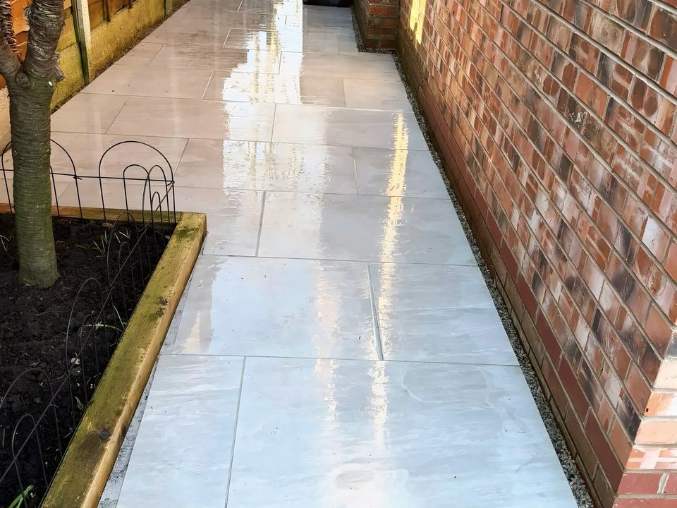After: Side path after jet washing, the slabs clean and still wet